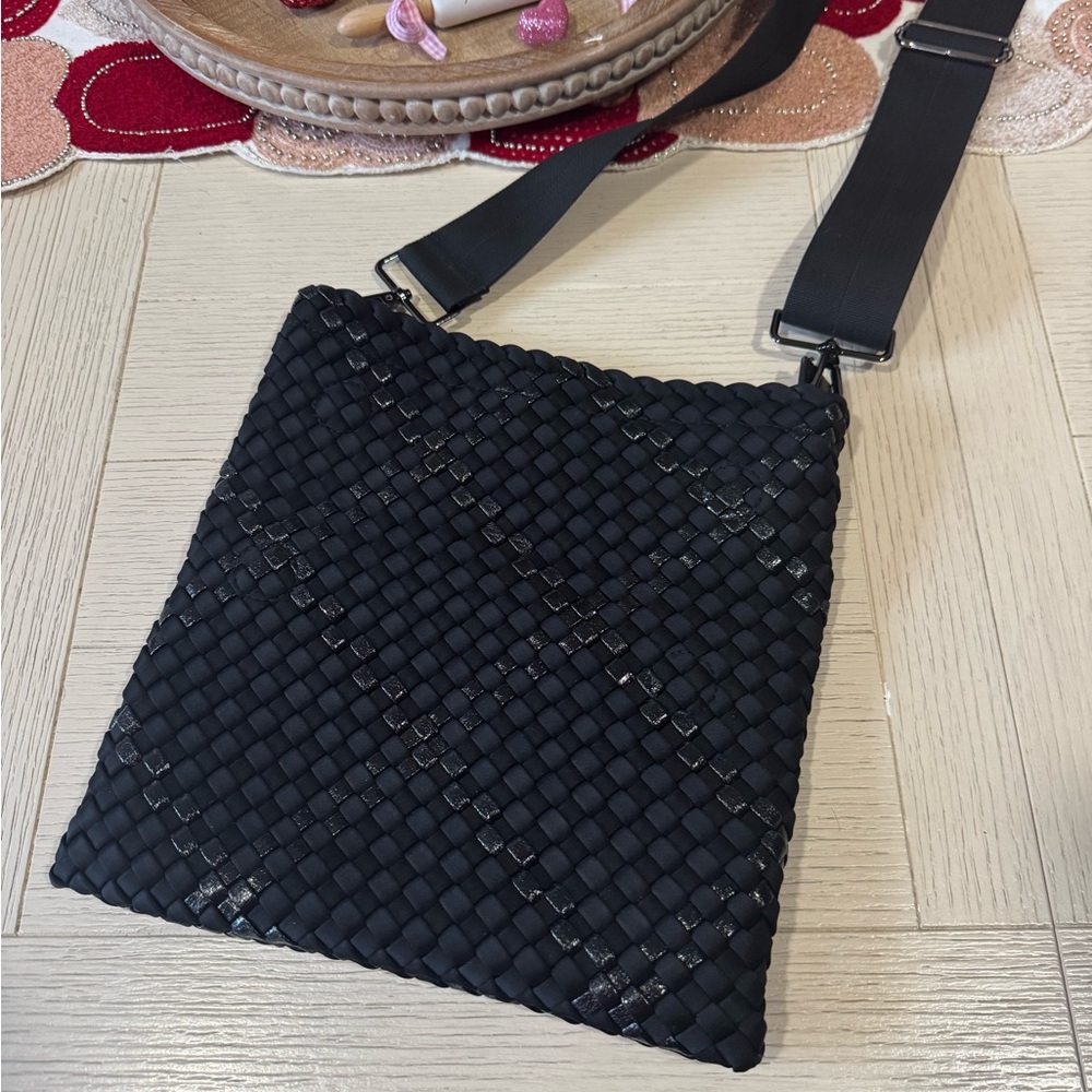 HAUTE SHORE Black Crossbody Bag with Adjustable Strap and Textured Design